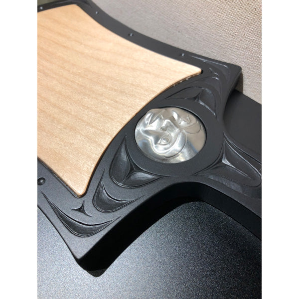 Cheese board with Indigenous motif design and pewter moon mask
