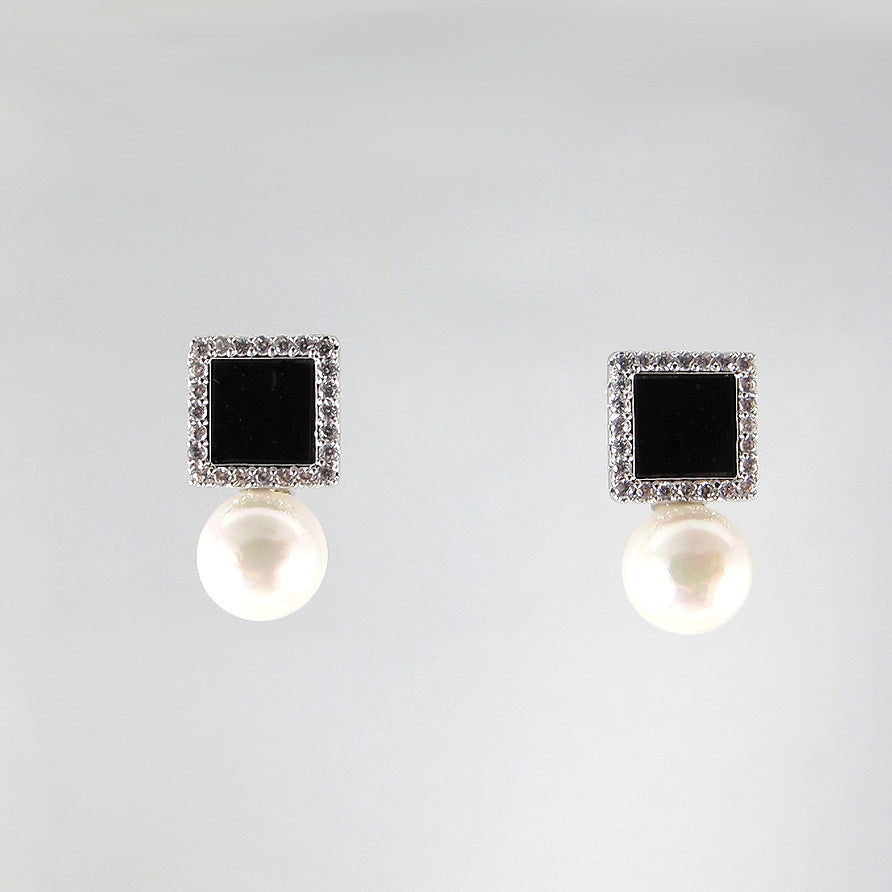 Elegant cubic zirconia and faux pearl stud earrings
