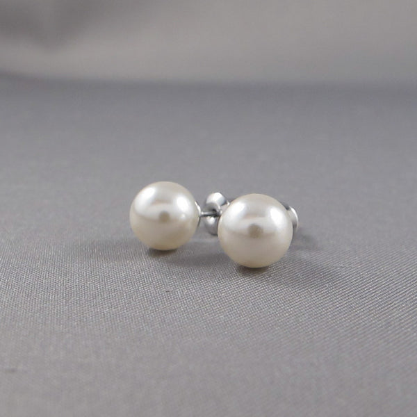 Timeless faux pearl stud earrings