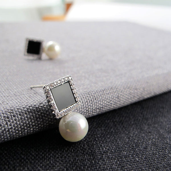 Elegant  cubic zirconia and faux pearl stud earrings