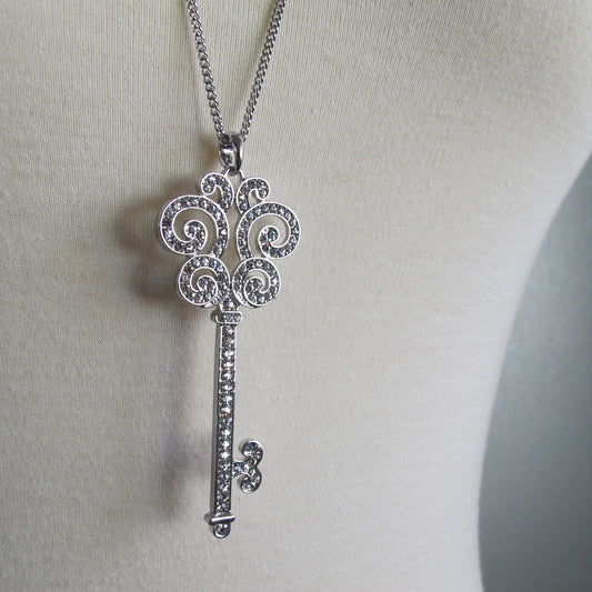 Glimmering key pendant long necklace