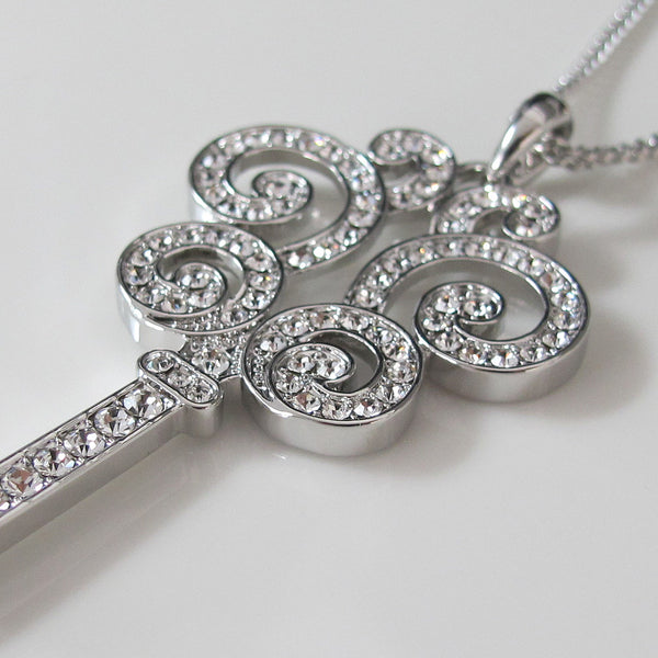 Glimmering key pendant long necklace